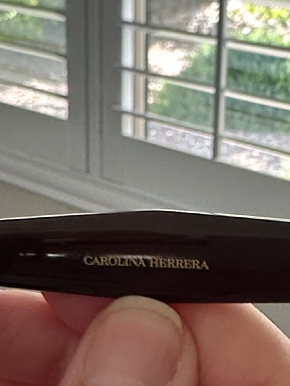 Carolina Herrera Glossy Black Mascara with Gold Logo